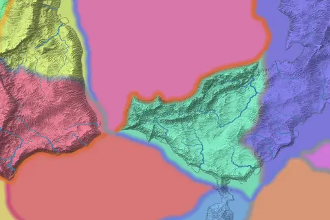 The tectonic plates view of a continent's east coast and the island beyond it: each plate a flat tint over the shaded relief, rose, yellow, pink, green, violet and red, with a bright seam where two plates meet and ridges raised along the seams on land.
