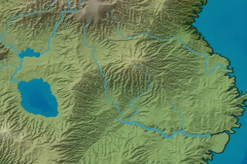 A coast of green hills in the Natural style: rivers gathering off the hills and winding east to the sea, two lakes in the lowland to the west, and a volcanic peak at the top of the frame.