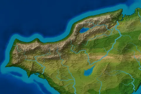 A long mountainous island in the Natural style: a ridge along its north coast with a lake in it, green lowlands to the south, and a pale band of shallow shelf water following every coast before the deep blue sea.